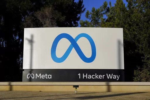 Meta's logo is seen on a sign at the company's headquarters, Nov. 9, 2022, in Menlo Park, Calif. Newly unredacted documents from New Mexico’s lawsuit against Meta released Wednesday, Jan. 17, 2024, underscore the Facebook and Instagram parent’s “historical reluctance” to keep children safe on its platforms, according to the complaint. (AP Photo/Godofredo A. Vásquez, File)