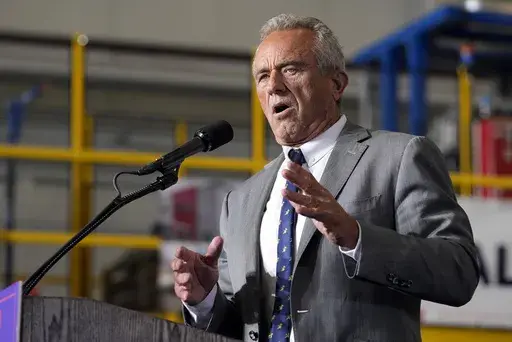 Robert F. Kennedy, Jr., speaks before Republican presidential nominee former President Donald Trump at a campaign event, Sept. 27, 2024 in Walker, Mich. (AP Photo/Carlos Osorio)