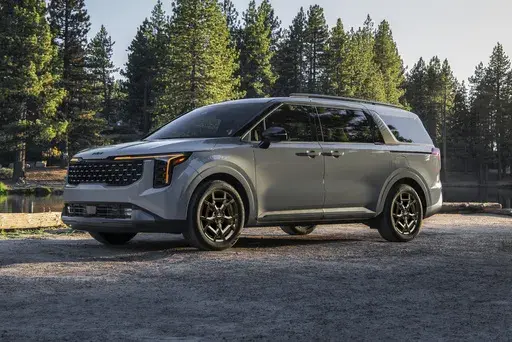 This photo provided by Kia shows the Carnival minivan, which is now available as a fuel-efficient hybrid. (Courtesy of Kia America via AP)