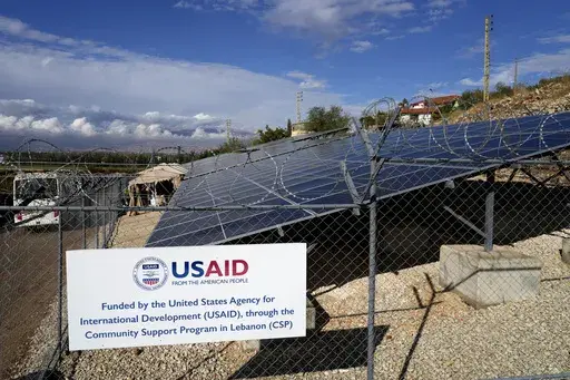 Solar panels system funded by United States Agency for International Development (USAID) are seen in the Lebanese-Syrian border town of Majdal Anjar, eastern Bekaa valley, Lebanon, Nov. 9, 2022. (AP Photo/Bilal Hussein, File)