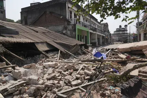 Damaged buildings are seen in the aftermath of an earthquake in Naypyitaw, Myanmar, Sunday, March 30, 2025. (AP Photo/Aung Shine Oo)
