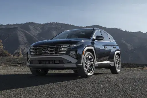 This photo provided by Hyundai of the Tucson Hybrid has slightly lower fuel economy than the RAV4 Hybrid, but it excels in other key areas. (Courtesy of Hyundai Motor America via AP)