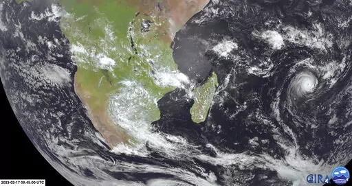 This image from Meteosat-9 satellite shows Cyclone Freddy, right, in the Indian Ocean near Madagascar, Friday, Feb. 17, 2023. Two weeks after Tropical Cyclone Cheneso devastated Madagascar, the Indian Ocean island nation and its neighbors are bracing for a more powerful Cyclone Freddy. (NOAA via AP)