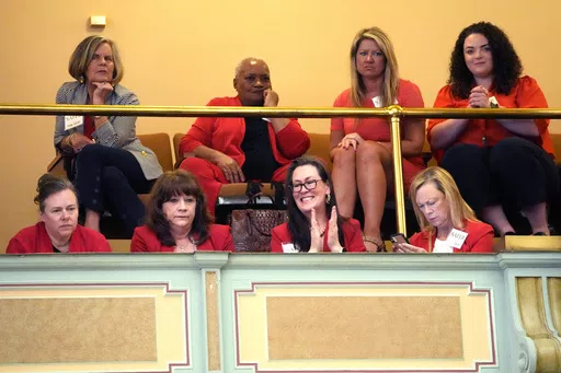 A group of Republican women from throughout the state watch procedures in the Senate chamber at the state Capitol in Jackson, Miss., Thursday, May 2, 2024. (AP Photo/Rogelio V. Solis)