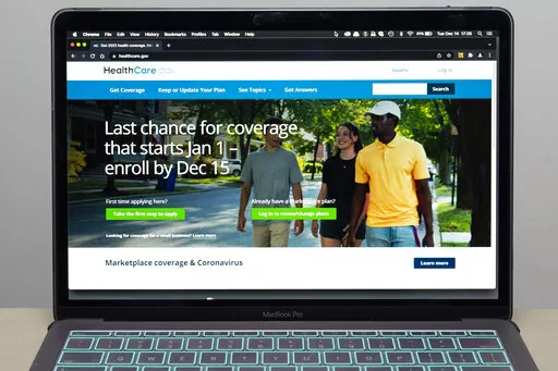 The healthcare.gov website is seen, on Dec. 14, 2021 in Fort Washington, Md. Millions of people in the United States will be spared from big increases in health care costs next year after President Joe Biden signed legislation extending generous subsidies for those who buy plans through federal and state marketplaces. (AP Photo/Alex Brandon, File)