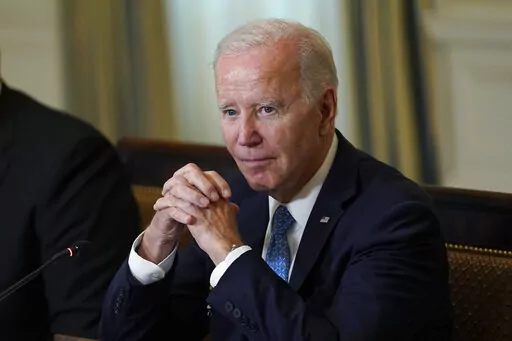 President Joe Biden waits for members of the press to leave after speaking at a meeting of the White House Competition Council in the State Dining Room of the White House in Washington, Monday, Sept. 26, 2022. (AP Photo/Susan Walsh)