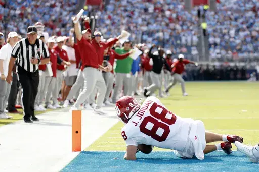 Oklahoma wide receiver Jacob Jordan (88) makes a touchdown during the first half of an NCAA college football game against Mississippi, Saturday, Oct. 26, 2024, in Oxford, Miss. (AP Photo/Sarah Warnock)
