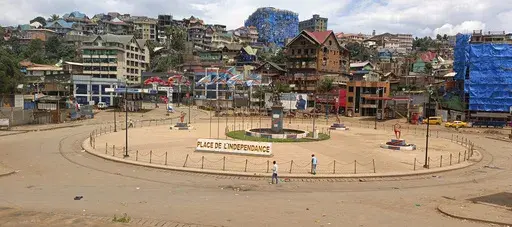 People walk past an independence square in Bukavu, eastern Congo, Saturday, Feb. 15, 2025. (AP Photo/Janvier Barhahiga)