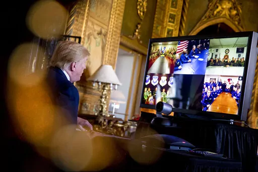 President Donald Trump speaks during a Christmas Eve video teleconference with members of the military at his Mar-a-Lago estate in Palm Beach, Fla., Tuesday, Dec. 24, 2019. A Las Vegas city councilwoman has been spending thousands on television ads in her quest to be Nevada's next governor. But Michele Fiore isn't only airing those ads to be seen by millions of Nevada voters. She's also targeting an audience of one in faraway Florida.   (AP Photo/Andrew Harnik.File)