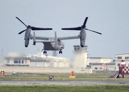 A U.S. military CV-22 Osprey takes off from Iwakuni base, Yamaguchi prefecture, western Japan, on July 4, 2018. Japanese and American military divers have spotted what could be the remains of a U.S. Air Force Osprey aircraft that crashed last week off southwestern Japan and several of the six crewmembers who are still missing, local media reported Monday, Dec. 4, 2023. (Kyodo News via AP, File)
