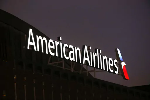 The American Airlines logo on top of the American Airlines Center in Dallas, Texas, is pictured on Dec. 19, 2017. Pilots at American Airlines are voting to authorize a strike. That doesn't mean they're going to walk off the job anytime soon, but it does aim to put more pressure on the airline to reach a new contract with the pilots' union. The union said Monday, May 1, 2023 that almost all its members took part in the voting, and that 99% of those who voted authorized the union to call for a str