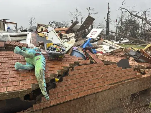 A home is in ruins after severe weather passed through Lake City, Ark., on Thursday, April 3, 2025. (AP Photo/Adrian Sainz)