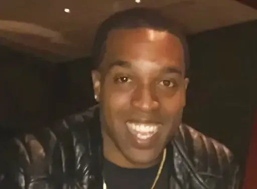 This photo provided by Ray Rice shows Ferguson Police Officer Travis Brown, who continues to "fight for his life" after suffering a brain injury when a protest turned violent on Friday, Aug. 9, 2024, in Ferguson, Mo. (Ray Rice/Ferguson Police Department via AP)