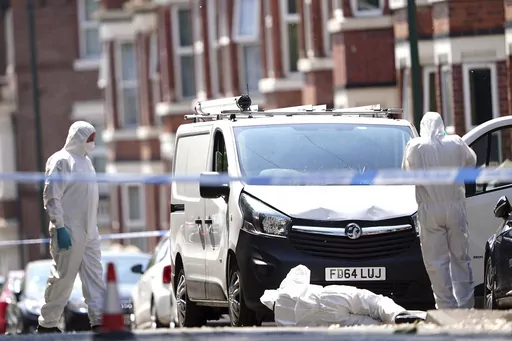 Police forensics officers search a white van on the corner of Maples Street and Bentinck Road in Nottingham, as three people have been found dead in the city in what police described as a "horrific and tragic incident". A 31-year-old man has been arrested on suspicion of murder after two people were found dead in the street in Ilkeston Road just after 4am on Tuesday. A third man was found dead in Magdala Road, Nottinghamshire Police said. Another three people are in hospital after someone tried 