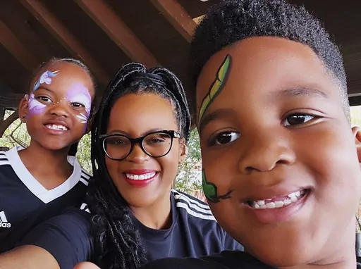 This image provided by Lakesha Cole shows Kirby, Lakesha and Keegan Cole during winter school break on December 30, 2022, at Legoland in Winter Haven, Fla. Family fun and a flexible schedule are priorities during school breaks, but Cole begins putting systems in place to organize her home and get her kids on an early bedtime schedule ahead of the first day of school. (Lakesha Cole via AP)