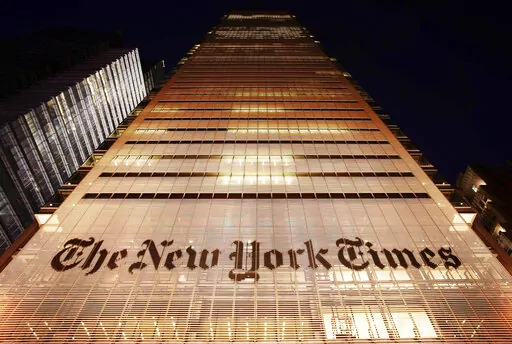 The New York Times building is shown on Oct. 21, 2009, in New York. The New York Times is bracing for a 24-hour walkout Thursday, Dec. 8, 2022, by hundreds of journalists and other employees, in what would be the first strike of its kind at the newspaper in more than 40 years. (AP Photo/Mark Lennihan, File)