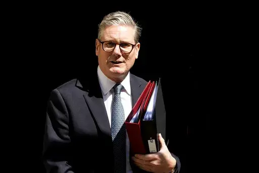 Britain's Prime Minister Keir Starmer leaves 10 Downing Street to attend the weekly Prime Ministers' Questions session in parliament in London, July 24, 2024. (AP Photo/Frank Augstein, File)