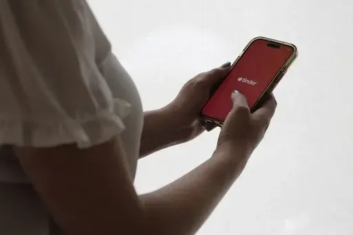 The dating app Tinder is shown on a smartphone on June 26, 2024, in New York. (AP Photo/Peter Morgan, File)