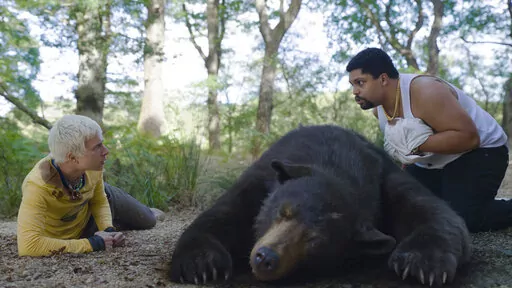 This image released by Universal Pictures shows Aaron Holliday, left, and O'Shea Jackson, Jr. in a scene from "Cocaine Bear." (Universal Pictures via AP)