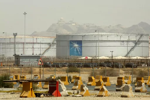 Storage tanks are seen at the North Jiddah bulk plant, an Aramco oil facility, in Jiddah, Saudi Arabia, on March 21, 2021. Saudi oil giant Aramco reported Sunday, March 10, 2024 a $121 billion profit last year, down from its 2022 record due to lower energy prices. (AP Photo/Amr Nabil, File)