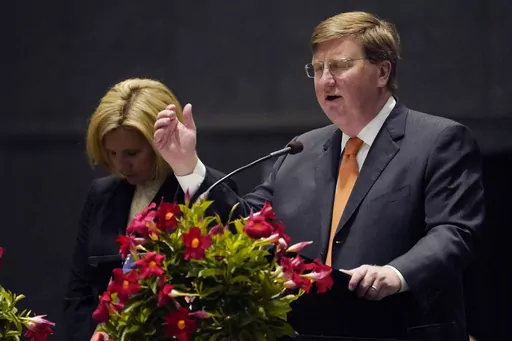 Mississippi's Republican Gov. Tate Reeves offers a prayer during a National Day of Prayer gathering at the Mississippi Coliseum in Jackson, Miss., Thursday, May 4, 2023. Reeves said Wednesday, May 17, that he has mobilized a National Guard unit to help with security at the U.S. border with Mexico. (AP Photo/Rogelio V. Solis, File)