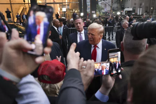 Former President Donald Trump speaks with construction workers at the construction site of the new JPMorgan Chase headquarters in midtown Manhattan, Thursday, April 25, 2024, in New York. (AP Photo/Yuki Iwamura, File)