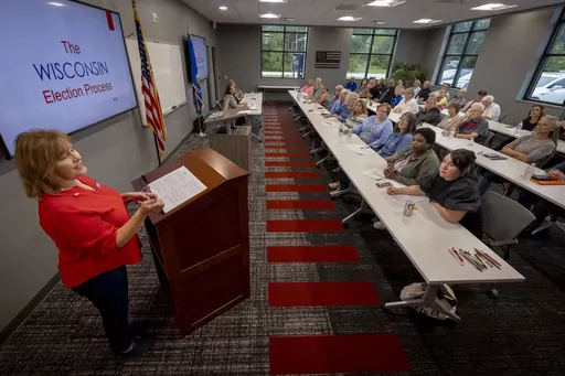 Kathy Bernier, state director of the nonprofit Keep Our Republic, talks during a community engagement event led by the grassroots group on Monday, Sept. 25, 2023, in Suamico, Wis. (AP Photo/Mike Roemer)