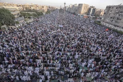 Egyptian Muslims perform Eid al-Fitr prayers outside al-Seddik mosque in Cairo, Egypt, Friday, April 21, 2023. In the Middle East and North Africa, where religion is often ingrained in daily life's very fabric, rejecting faith can come with social or other repercussions, so many of the "nones," a group that includes agnostics, atheists and "nothing in particular" conceal that part of themselves, as blasphemy laws and policies are widespread in the region. (AP Photo/Amr Nabil, File)