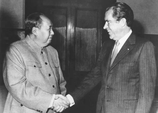 Then Chinese communist party leader Mao Zedong, left, and then U.S. President Richard Nixon shake hands as they meet in Beijing on Feb. 21, 1972. At the height of the Cold War, U.S. President Richard Nixon flew into communist China's center of power for a visit that over time would transform U.S.-China relations and China's position in the world in ways that were unimaginable at the time. (AP Photo, File)
