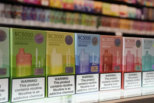 Varieties of disposable flavored electronic cigarette devices manufactured by EB Design, formerly known as Elf Bar, are displayed at a store in Pinecrest, Fla., Monday, June 26, 2023. U.S. officials are seizing more shipments of unauthorized electronic cigarettes. But industry data shows thousands of new flavored products continue pouring into the country from China. (AP Photo/Rebecca Blackwell, File)