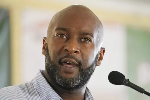 Shuwaski Young, the Democratic candidate for Mississippi's Third Congressional District addresses the crowd at the pavilion in Founders Square at the Neshoba County Fair in Philadelphia, Miss., Wednesday, July 27, 2022. At a Wednesday, Sept. 6, 2023, State Board of Election Commissioners meeting, Mississippi Gov. Tate Reeves and Attorney General Lynn Fitch approved Young's request to withdraw as the Democratic nominee for secretary of state due to health issues. The move allows the state Democra