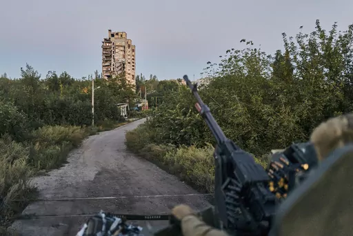 A Ukrainian soldier sits in his position in Avdiivka, Donetsk region, Ukraine, on Aug. 18, 2023. Ukrainian troops are under intense pressure from a determined Russian effort to storm the strategically important eastern Ukraine city of Avdiivka, officials say. Kyiv’s army is struggling with ammunition shortages as the Kremlin’s forces pursue a battlefield triumph around the two-year anniversary of Moscow’s full-scale invasion and ahead of a March presidential election in Russia. (AP Photo/L