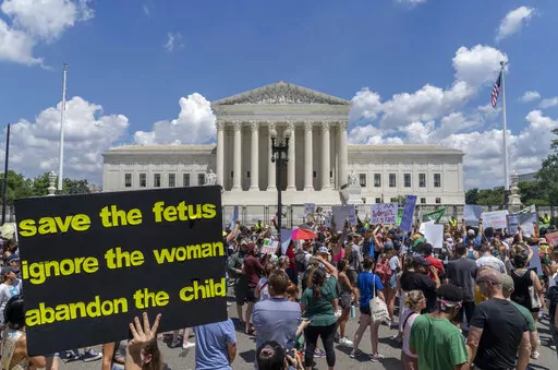 Abortion-rights protesters demonstrate outside the Supreme Court in Washington, Saturday, June 25, 2022. A new poll finds a growing percentage of Americans calling out abortion or women’s rights as priorities for the government in the wake of the Supreme Court’s decision to overturn Roe v. Wade, especially among Democrats and those who support abortion access.  (AP Photo/Gemunu Amarasinghe, File)