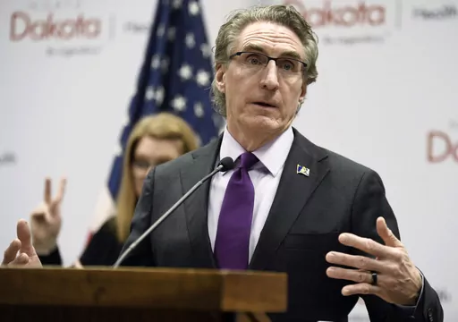 North Dakota Gov. Doug Burgum speaks at the state Capitol on April 10, 2020, in Bismarck, N.D. Teachers in North Dakota can still refer to transgender students by the personal pronouns they use, after lawmakers on Monday, April 3, 2023, failed to override the governor’s veto of a controversial bill to place restrictions on educators. (Mike McCleary/The Bismarck Tribune via AP, File)