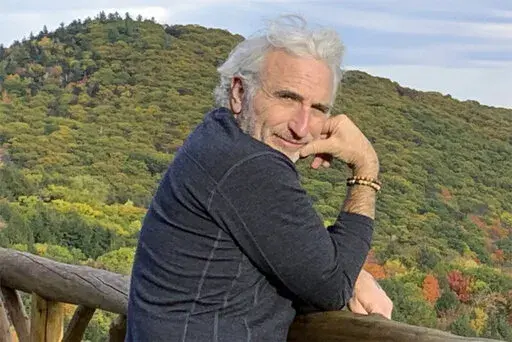 This 2019 photo shows Howard Irwin Fischer in Vermont. Fischer is one supporter who sees human composting as an eco-friendly way to return his remains to the earth as fresh, fertile soil when he dies. (Randee Fischer via AP)