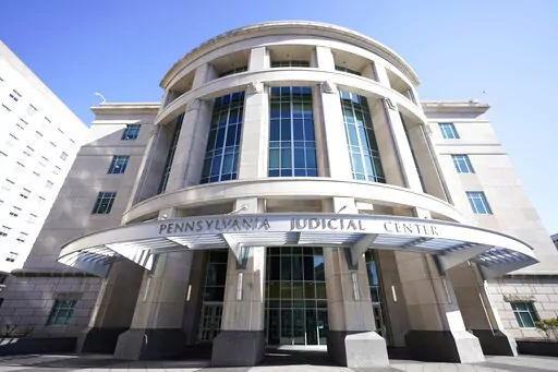 This Nov. 6, 2020, photo shows a general view of the Pennsylvania Judicial Center, home to the Commonwealth Court in Harrisburg, Pa. The Supreme Court has turned away efforts from Republicans in North Carolina and Pennsylvania to block state court-ordered congressional districting plans more favorable to Democrats. In separate orders late March 7, 2022, the justices are allowing maps selected by each state's Supreme Court to be in effect for the 2022 elections. (AP Photo/Julio Cortez, File)