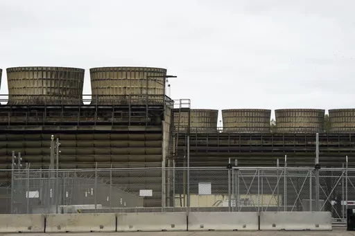 Cooling towers release heat generated by boiling water reactors at Xcel Energy's Nuclear Generating Plant on Oct. 2, 2019, in Monticello, Minn. Minnesota regulators said Thursday, March 16, 2023, that they're monitoring the cleanup of a leak of 400,000 gallons of radioactive water from Xcel Energy's Monticello nuclear power plant in late November 2022. The company said there's no danger to the public. (Evan Frost/Minnesota Public Radio via AP, File)