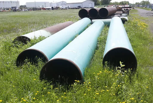 Pipeline used to carry crude oil is shown at the Superior, Wis., terminal of Enbridge Energy, June 29, 2018. The Biden administration is restoring federal regulations guiding environmental reviews of major infrastructure projects such as highways and pipelines that were scaled back by the Trump administration in a bid to fast-track the projects. A rule finalized Tuesday, April 19, 2022, will restore key provisions of the National Environmental Policy Act, a bedrock environmental law designed to 