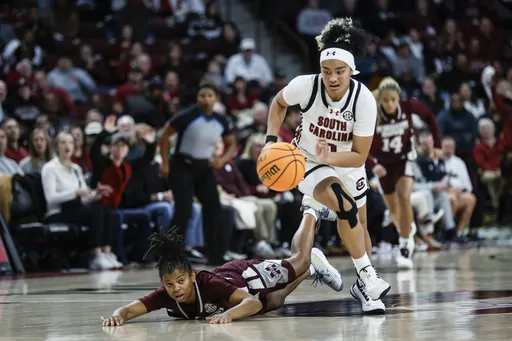 South Carolina guard Te-Hina Paopao, right, steals the ball from Mississippi State guard Lauren Park-Lane during the first half of an NCAA college basketball game in Columbia, S.C., Sunday, Jan. 7, 2024. (AP Photo/Nell Redmond)