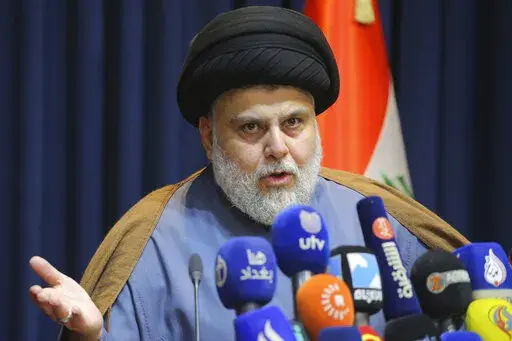 Populist Shiite cleric Muqtada al-Sadr, speaks during a mews conference in Najaf, Iraq, Thursday, Nov. 18, 2021. On Sunday, June 12, 2022, 73 lawmakers from the powerful cleric’s bloc submitted their resignation based on his request, to protest a persisting political deadlock eight months after general elections were held. (AP Photo/Anmar Khalil, File)