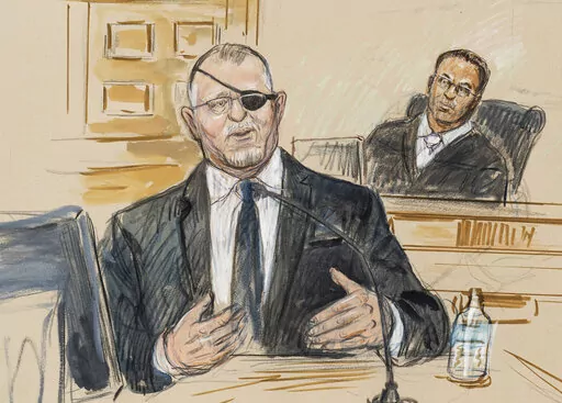 This artist sketch depicts the trial of Oath Keepers leader Stewart Rhodes, left, as he testifies before U.S. District Judge Amit Mehta on charges of seditious conspiracy in the Jan. 6, 2021, attack on the U.S. Capitol, in Washington, Nov. 7, 2022.  Jury deliberations are expected to begin soon. (Dana Verkouteren via A, File)