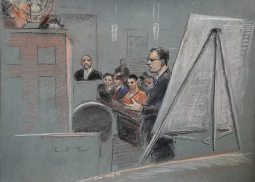 In this artist depiction, Massachusetts Air National Guardsman Jack Teixeira, center, is seated as defense attorney Brendan Kelley stands and speaks, at right, and his father Jack Michael Teixeira is seated in the witness stand, during a detention hearing in federal court, Thursday, April 27, 2023, in Worcester, Mass. Magistrate Judge David Hennessy in Teixeira's detention hearing put off an immediate decision on whether he should be kept in custody until his trial or released to home confinemen