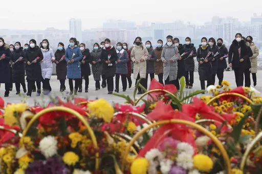 North Koreans visit and pay respect to the statues of late leaders Kim Il Sung and Kim Jong Il on Mansu Hill in Pyongyang, North Korea, on, Jan. 22, 2023, on the occasion of the Lunar New Year. Russia’s embassy in North Korea says the country has eased stringent epidemic controls in capital Pyongyang that were placed during the past five days to slow the spread of respiratory illnesses. (AP Photo/Cha Song Ho, File)