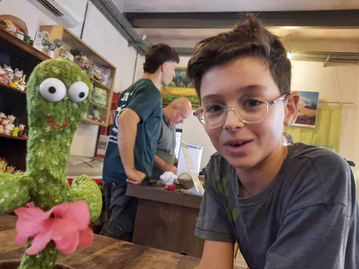 This photo provided by Avi Zichri shows his son, Ohad Munder-Zichri, on Oct. 1, 2023. Ohad turned 9 on Monday, Oct. 23, but instead of celebrating at home with his family and friends, he was somewhere in Gaza, one of more than 200 hostages held by Hamas since the militants' devastating Oct. 7 incursion. (Courtesy of Avi Zichri via AP)