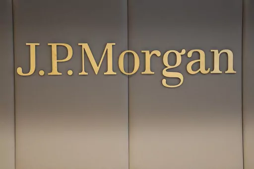The logo of JPMorgan bank is pictured at the new French headquarters of JP Morgan bank, Tuesday, June 29, 2021, in Paris. JPMorgan Chase is defending itself against a lawsuit by the U.S. Virgin Islands accusing it of empowering Jeffrey Epstein to abuse teenage girls. Lawyers for the giant bank said in court papers Tuesday, May 23, 2023, that it was the islands that enabled the financier to commit his crimes. (AP Photo/Michel Euler, Pool, File)