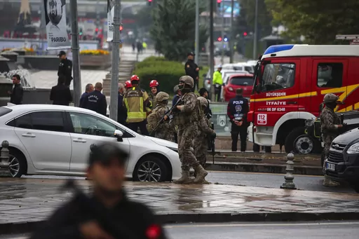 Turkish security forces cordon off an area after an explosion in Ankara, Sunday, Oct. 1, 2023. A suicide bomber detonated an explosive device in the heart of the Turkish capital, Ankara, on Sunday, hours before parliament was scheduled to reopen after a summer recess. A second assailant was killed in a shootout with police. (AP Photo/Ali Unal)