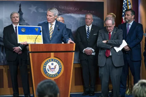 Sen. Rob Portman, R-Ohio, speaks during a news conference with Republican lawmakers about Ukraine, on Capitol Hill, Wednesday, March 2, 2022, in Washington. From left, Sen. John Hoeven, R-N.D., Portman, Sen. Lindsey Graham, R-S.C., Sen. Dan Sullivan, R-Alaska, Sen. Jim Risch, R-Idaho, and Sen. Ted Cruz, R-Texas. (AP Photo/Evan Vucci)
