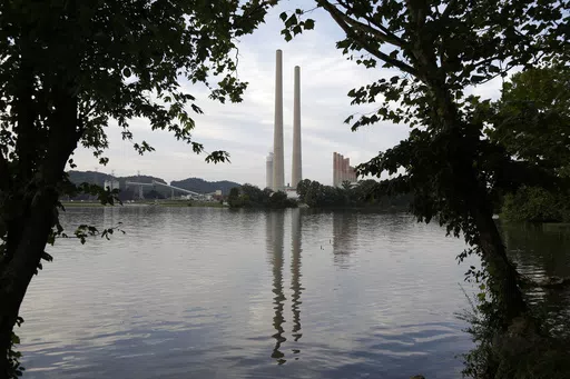 In this Aug. 7, 2019, photo, the Kingston Fossil Plant stands near a waterway in Kingston, Tenn. The nation’s largest public utility is moving ahead with a plan for a new natural gas plant in Tennessee despite warnings that its environmental review of the project doesn’t comply with federal law. The Environmental Protection Agency asked the Tennessee Valley Authority in a March 25, 2024 letter to redo several aspects of its environmental impact statement for converting the coal-burning Kings