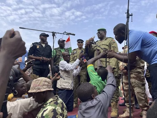 Mohamed Toumba, one of the soldiers who ousted Nigerian President Mohamed Bazoum, addresses supporters of Niger's ruling junta in Niamey, Niger, Sunday, Aug. 6, 2023. The U.S. is making precautionary plans to evacuate two key drone and counter-terror bases in Niger if that becomes necessary under the West African nation’s new ruling junta. That word came Friday, Aug. 18, from the Air Force commander for Africa, Gen. James Hecker. The Air Force general stressed to reporters in Washington that t