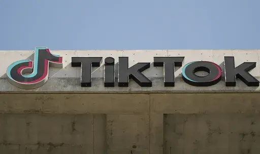 A TikTok sign is displayed on their building in Culver City, Calif., March 11, 2024. (AP Photo/Damian Dovarganes, File)